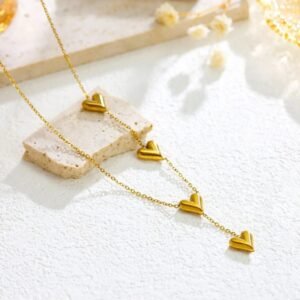 JUALIVA Cascading Hearts Gold Drop Necklace – Elegant Multi-Heart Chain Jewellery