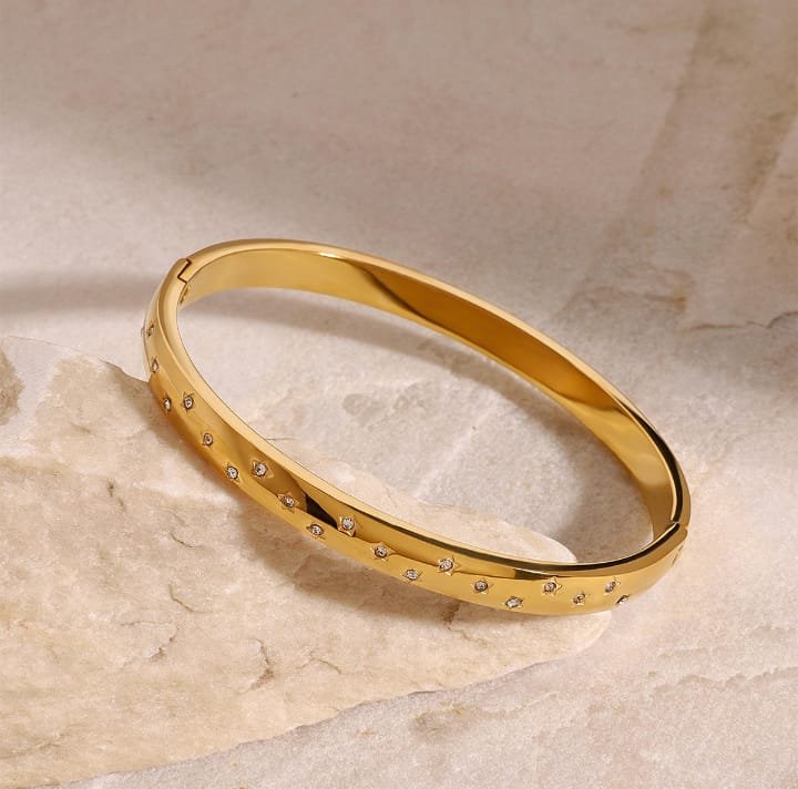 JUALIVA Premium Gold-Plated Crystal Studded Stainless Steel Bangle Bracelet for Women (Waterproof & Hypoallergenic)